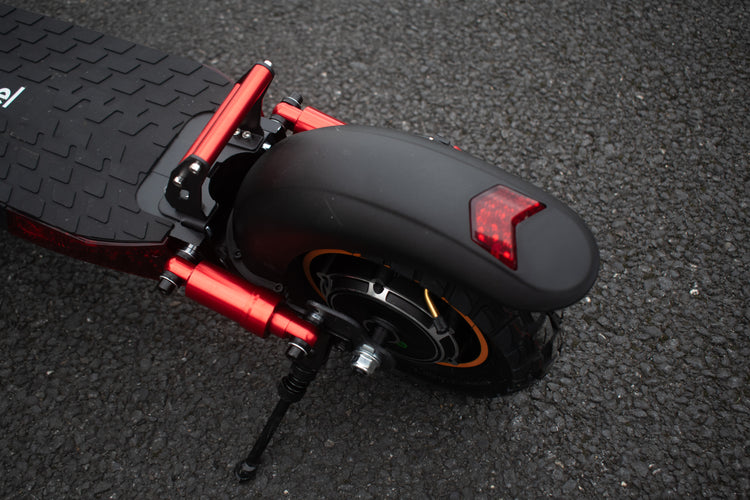 Front and rear disc brakes on Mankeel MX14 electric scooter with 10-inch tires