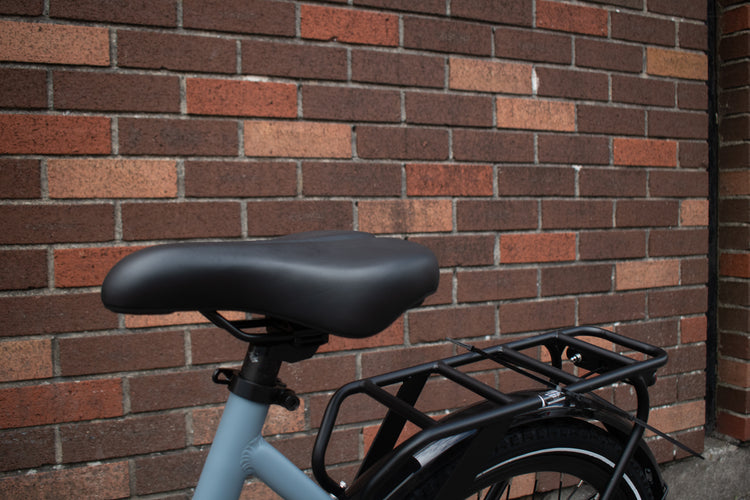 Adjustable seat and grip shifter on Koolux electric bicycle – comfort-focused features