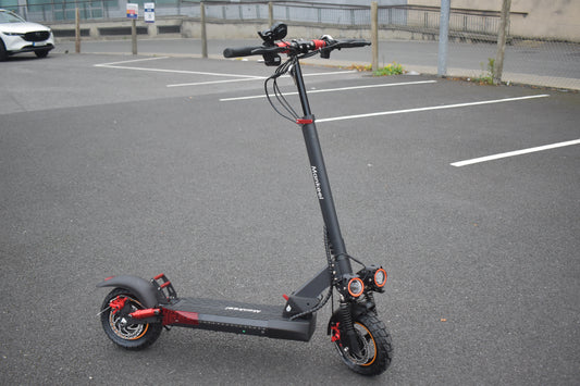 Front and rear disc brakes on Mankeel MX14 electric scooter with 10-inch tires